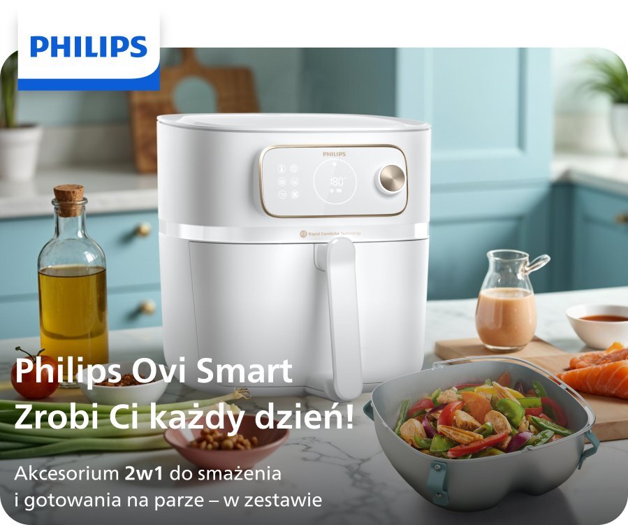 Na obrazie znajduje się biała frytkownica beztłuszczowa marki PHILIPS na blacie kuchennym, obok której stoi butelka z oliwą i miska z sałatką. Widoczny jest tekst: \'Philips Ovi Smart Zrobi Ci każdy dzień! Akcesorium 2w1 do smażenia i gotowania na parze – w zestawie\'.