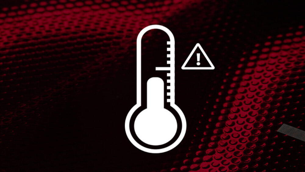 Na czerwonym tle widoczna jest ikona termometru z wykrzyknikiem w trójkącie, co może sugerować ostrzeżenie dotyczące temperatury.