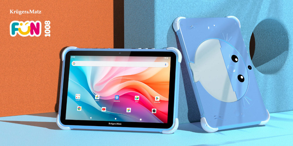 Na obrazie widoczny jest tablet z kolorowym ekranem oraz niebieska obudowa z rysunkiem przypominającym twarz zwierzęcia. W lewym górnym rogu znajduje się logo \'Krüger&Matz FUN 1008\'.