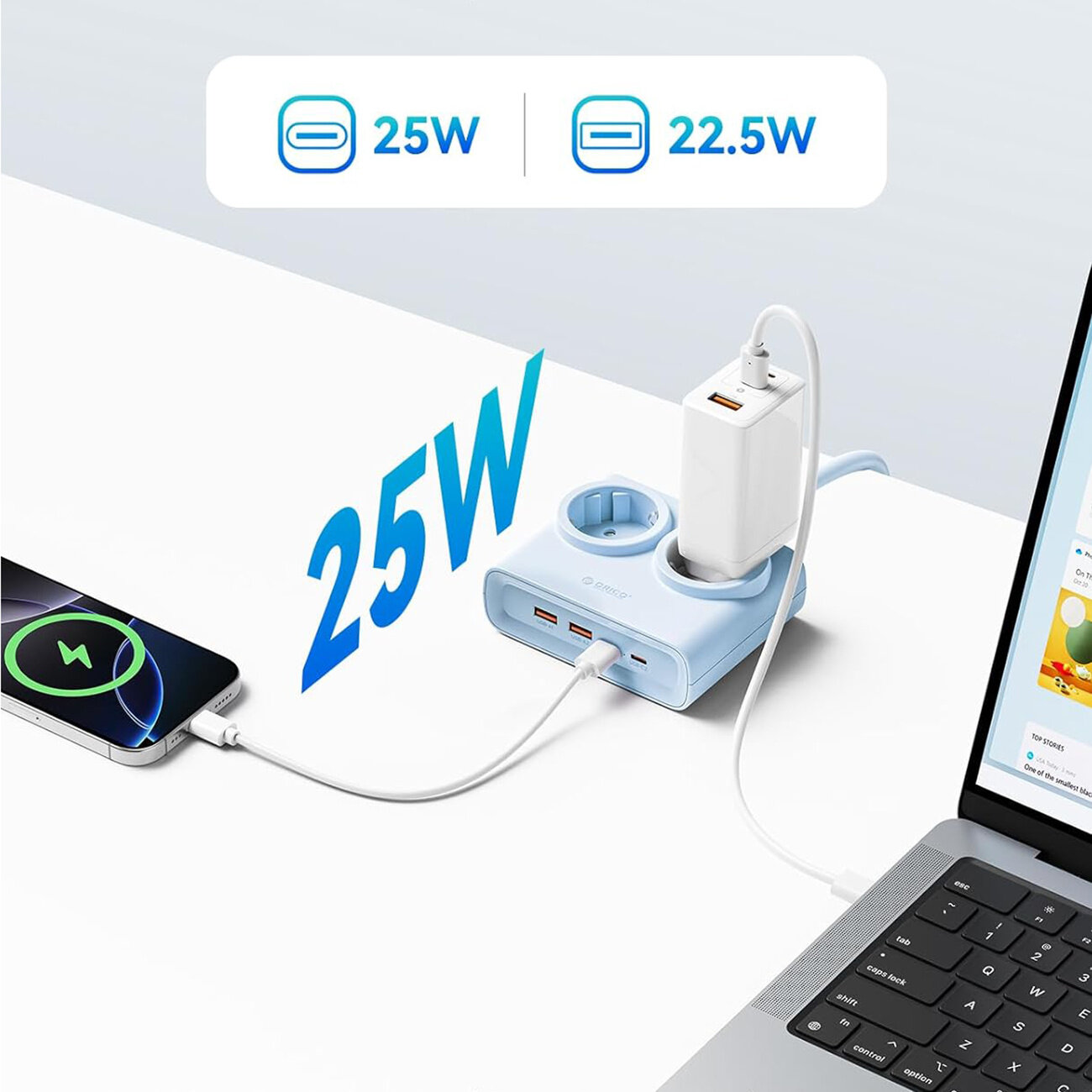 Na obrazie widoczna jest niebieska listwa zasilająca z dwoma gniazdami AC, dwoma portami USB-A i dwoma portami USB-C. Obok listwy znajduje się telefon i laptop podłączone do niej kablami, a na górze widnieje napis \'25W\' oraz \'22.5W\'.