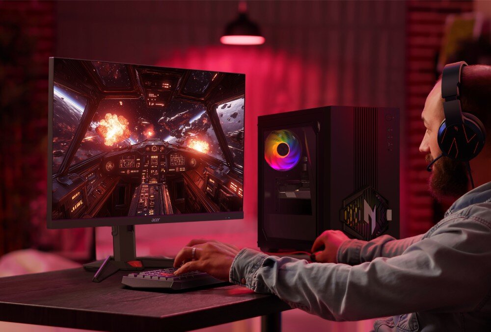 Komputer ACER Nitro N30-100 Przedni panel obudowy komputerowej z pionowymi liniami, przyciskiem zasilania, portami oraz sześciokątnym elementem ozdobnym z podświetlonym symbolem