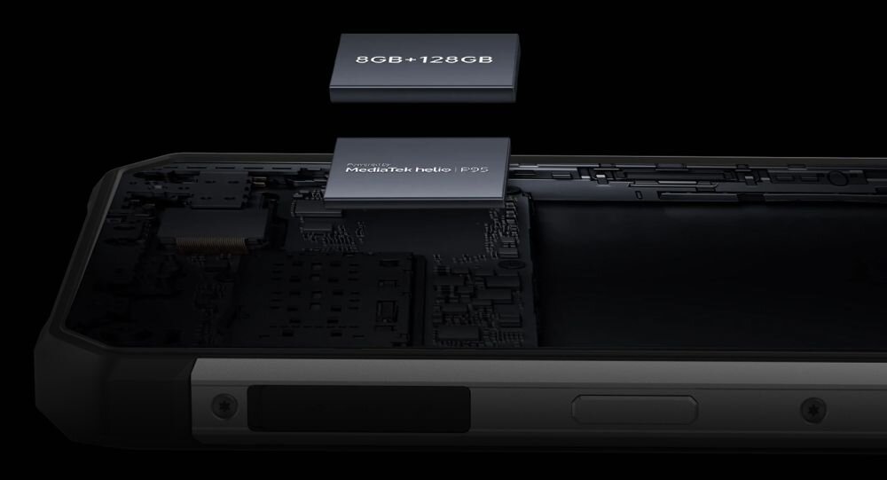 Obraz przedstawia wnętrze smartfona z widocznymi komponentami elektronicznymi. Na górze widoczne są dwa elementy z napisami: \'8GB+128GB\' oraz \'MediaTek Helio G95\'.