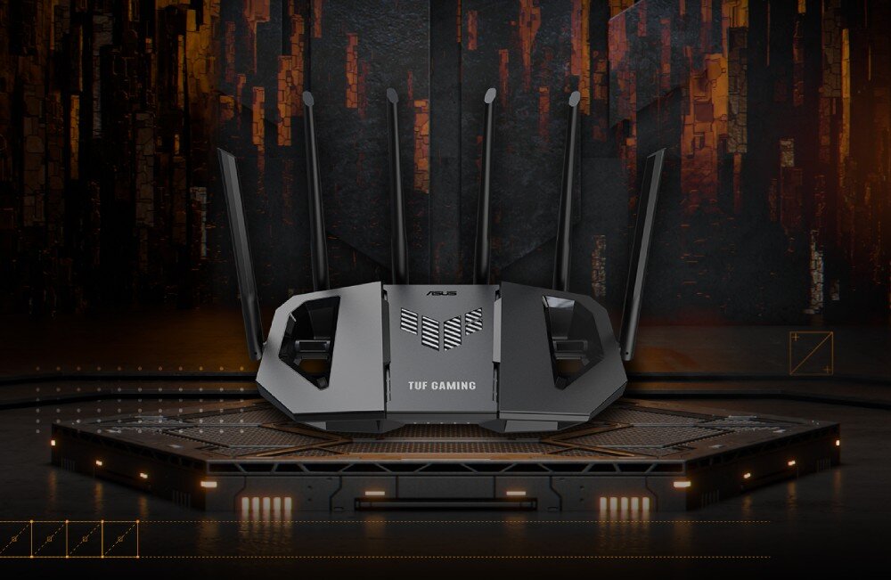 Na obrazie widoczny jest router z sześcioma antenami, umieszczony na futurystycznej platformie. Na urządzeniu znajduje się logo \'ASUS\' oraz napis \'TUF GAMING\'.