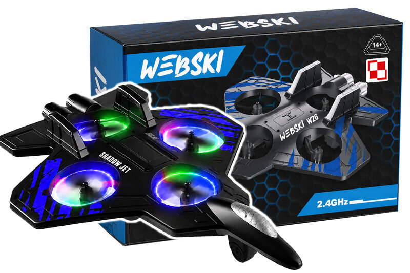 Na obrazie widoczny jest czarny dron z kolorowymi światłami na wirnikach, obok którego znajduje się pudełko z napisem \'WEBSKI\'. Na pudełku widnieje również oznaczenie \'2.4GHz\' oraz symbol sugerujący wiek 14+.