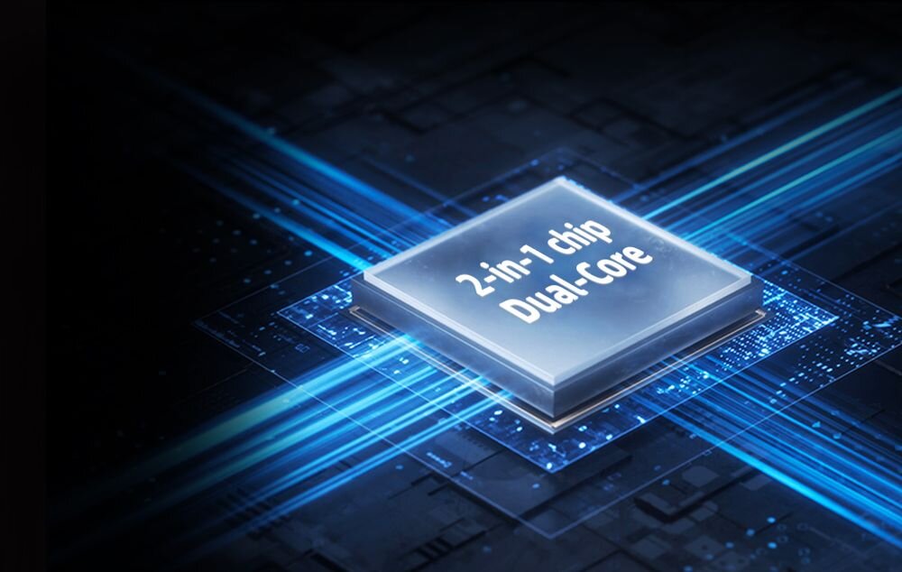 Obraz przedstawia chip z napisem \'2-in-1 chip Dual-Core\' na tle schematu elektronicznego z niebieskimi liniami.