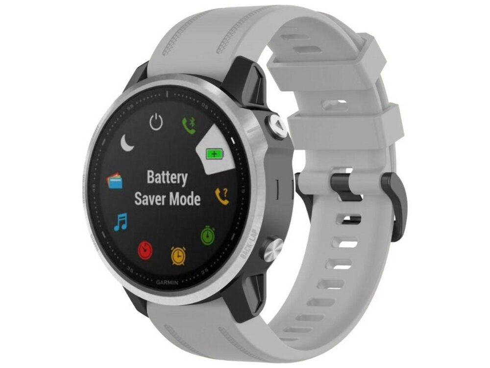 Szary pasek zegarka z okrągłym wyświetlaczem, na którym widoczny jest napis \'Battery Saver Mode\' oraz różne kolorowe ikony. Na obudowie zegarka znajduje się logo \'Garmin\'.