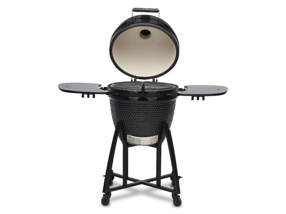 Otwarty grill ceramiczny węglowy z okrągłą pokrywą, bocznymi półkami i termometrem, umieszczony na stojaku z kółkami.