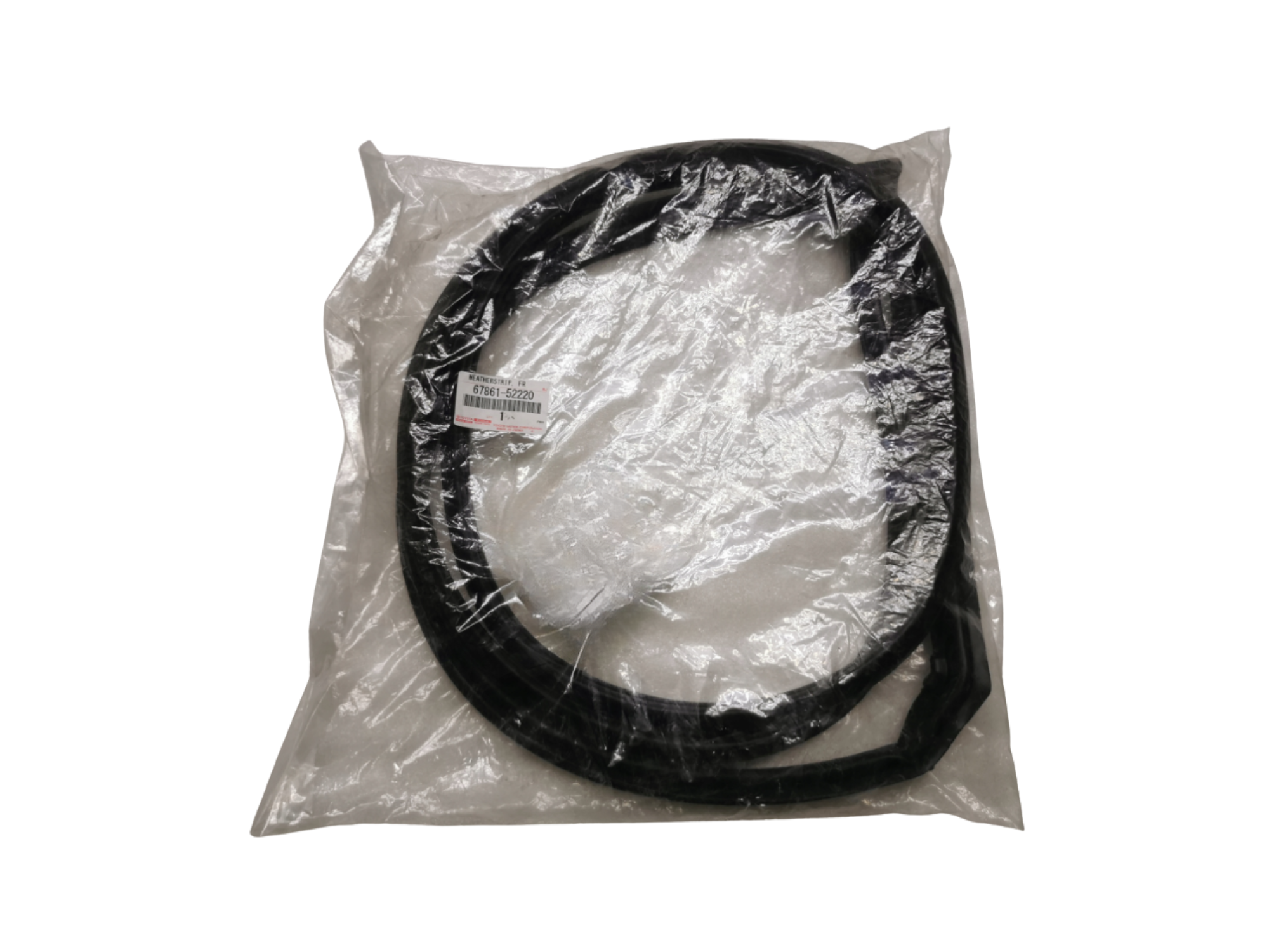 Czarna uszczelka drzwiowa zapakowana w przezroczystą plastikową torbę z widoczną etykietą z numerem 67861-52220.