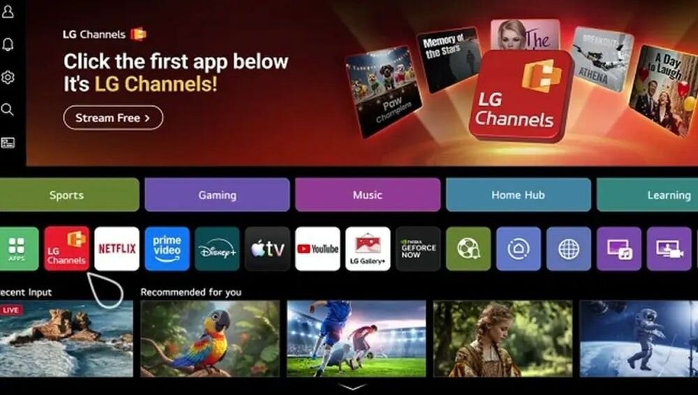 Interfejs telewizora z aplikacjami takimi jak Netflix, Prime Video, Disney+, YouTube i LG Channels. Na górze widoczny jest baner z napisem \'Click the first app below It\'s LG Channels!\' oraz przyciskiem \'Stream Free\'.