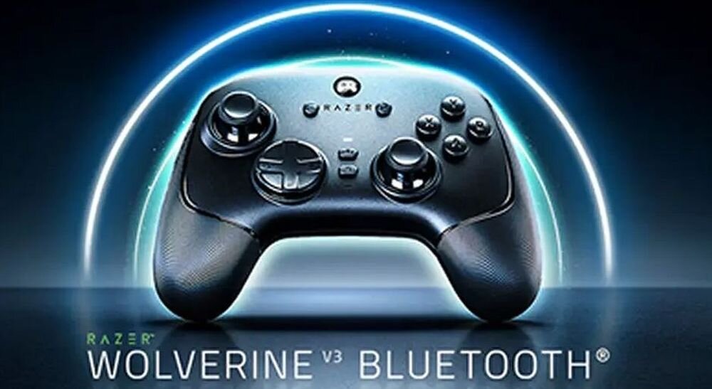 Na obrazie widoczny jest czarny kontroler do gier z logo Razer, otoczony niebieską poświatą. Na dole znajduje się tekst: \'RAZER WOLVERINE V3 BLUETOOTH\'.