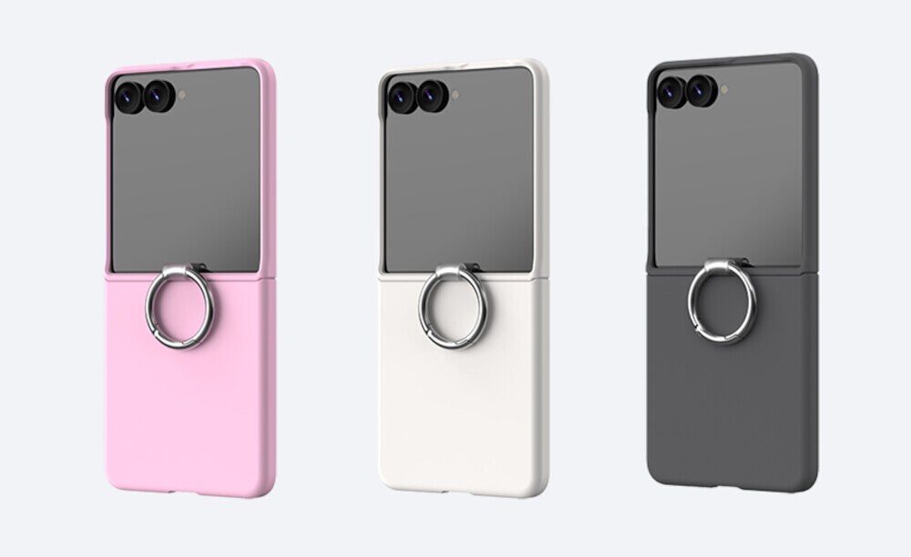 Trzy etui na telefon w kolorach różowym, białym i czarnym, każde z metalowym pierścieniem na tylnej części. Etui mają wycięcia na dwa obiektywy aparatu.