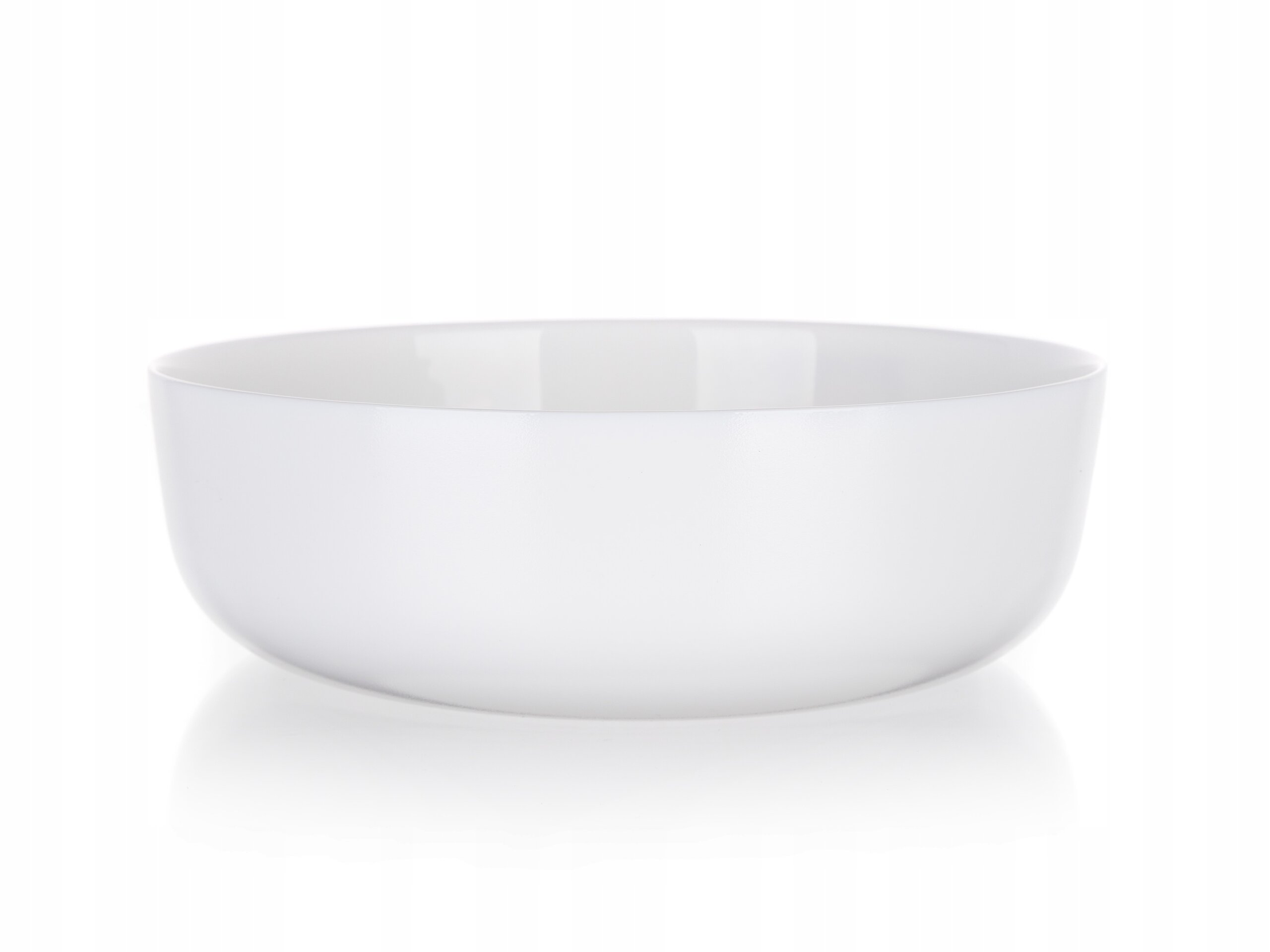 Na obrazie widoczna jest biała, okrągła miska o gładkiej powierzchni. Miska ma prosty, minimalistyczny design.