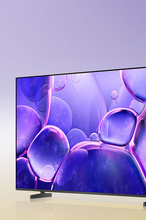 480x720-qn85fa kv mo Telewizor z cienką ramką wyświetla obraz z fioletowymi i różowymi bąbelkami na ekranie. Tło jest jasnofioletowe.