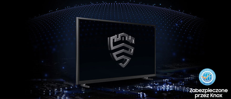 970x415 amsung-knox-security pc Telewizor z wyświetlonym na ekranie symbolem przypominającym tarczę. W prawym dolnym rogu znajduje się napis \'Zabezpieczone przez Knox\'.