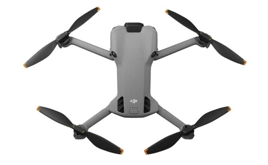 Дрон DJI Mini 5 Pro на білому тлі.