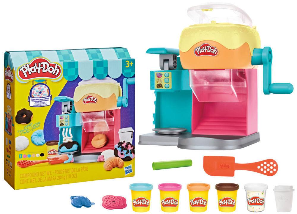 Zestaw do zabawy z ciastoliną Play-Doh, zawierający maszynkę do robienia pączków, sześć pojemników z ciastoliną w różnych kolorach oraz akcesoria. Na opakowaniu widnieje logo Play-Doh i oznaczenie wiekowe 3+.
