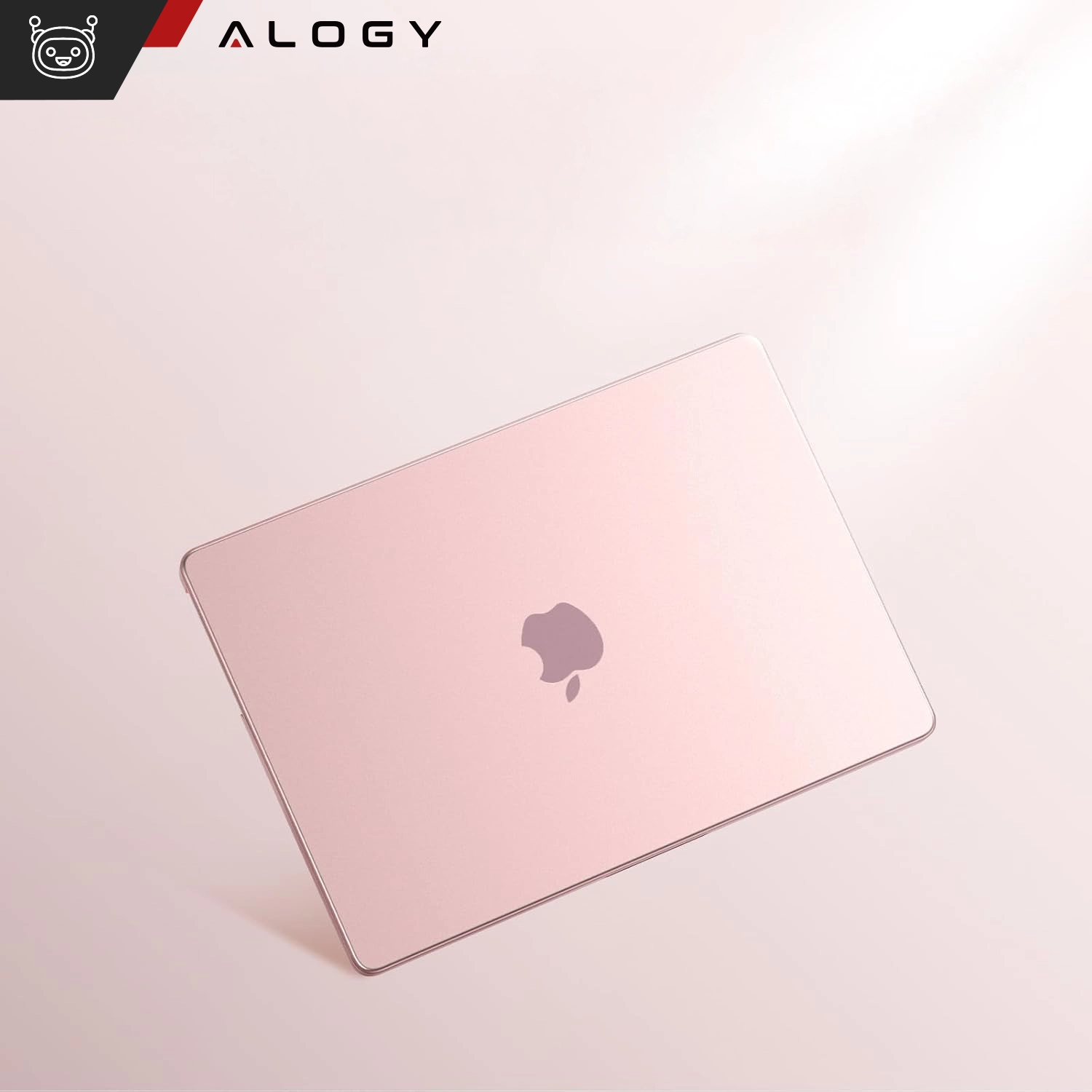 Na obrazie widoczny jest różowy laptop z przezroczystą matową obudową, na której znajduje się logo w kształcie jabłka. W lewym górnym rogu widnieje logo \'ALOGY\'.