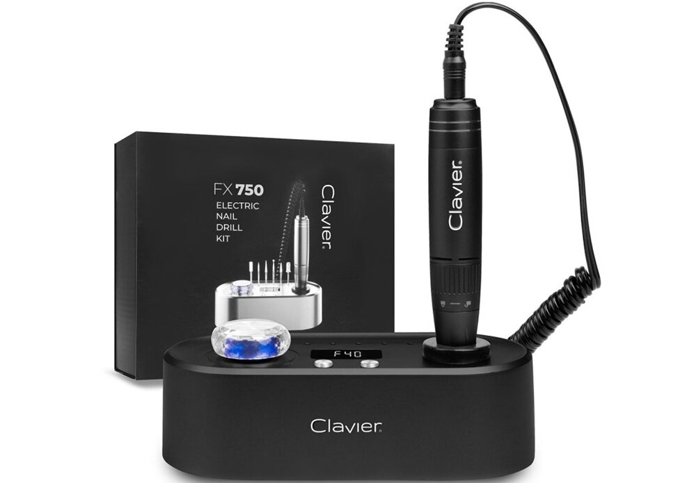 Na obrazie widoczna jest czarna frezarka do paznokci z napisem \'Clavier\' oraz pudełko z napisem \'FX 750 ELECTRIC NAIL DRILL KIT\'.