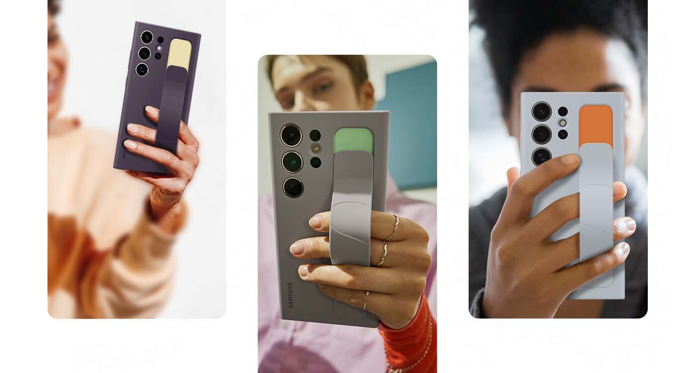 Etui standing grip case EF-GS928, EF-GS926, EF-GS921 do telefonów z serii Galaxy S24 dostępne w Media Expert Trzy osoby trzymają smartfony z zamontowanymi etui z uchwytem w różnych kolorach: ciemnofioletowym, zielonym i pomarańczowym. Etui mają wycięcia na aparaty i logo producenta jest widoczne na jednym z telefonów.