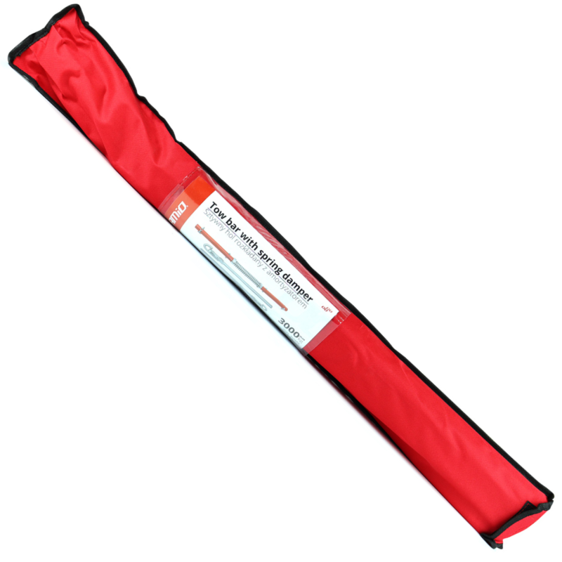 Czerwony pokrowiec z czarnymi krawędziami zawierający produkt, na którym widnieje etykieta z napisem \'Tow bar with spring damper\' oraz \'3000KG\'.