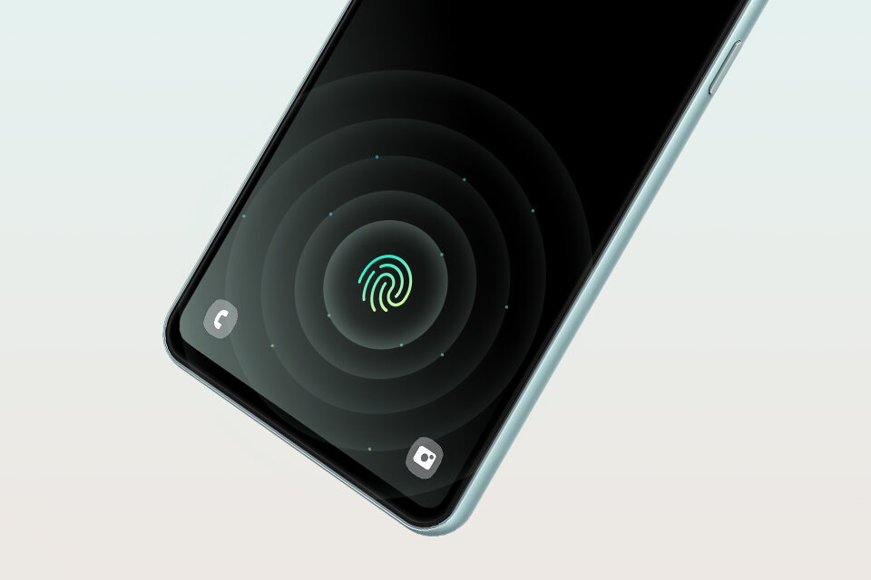 Smartfon z wyświetlaczem pokazującym ikonę odcisku palca na środku ekranu. Na ekranie widoczne są także ikony telefonu i aparatu.