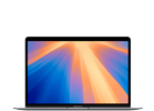Laptop z wyświetlaczem pokazującym kolorowe promienie w odcieniach pomarańczowego i niebieskiego. Na obudowie widoczne jest logo producenta: APPLE.