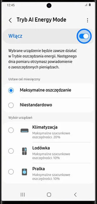 Ekran smartfona z aplikacją Tryb AI Energy Mode, gdzie można włączyć tryb oszczędzania energii. Opcje wyboru obejmują maksymalne oszczędzanie, niestandardowe oraz urządzenia takie jak klimatyzacja, lodówka i pralka z podanymi szacunkowymi oszczędnościami.