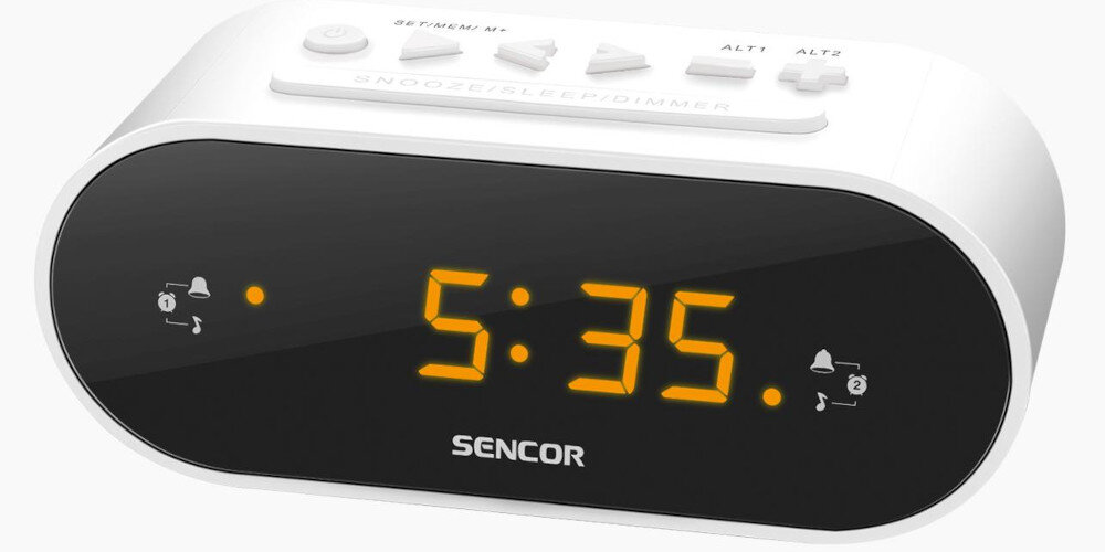 Radiobudzik z wyświetlaczem LED pokazującym godzinę 5:35, z logo \'SENCOR\' poniżej. Na górze urządzenia znajdują się przyciski z oznaczeniami, w tym \'SNOOZE/SLEEP/DIMMER\'.