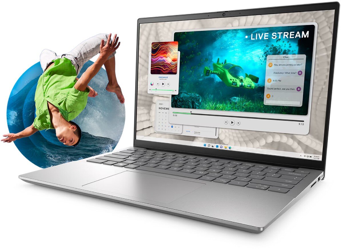 Na obrazie widoczny jest laptop z otwartym ekranem, na którym wyświetlany jest interfejs z napisem \'LIVE STREAM\'. Obok laptopa znajduje się postać wykonująca akrobację na tle niebieskiego koła.