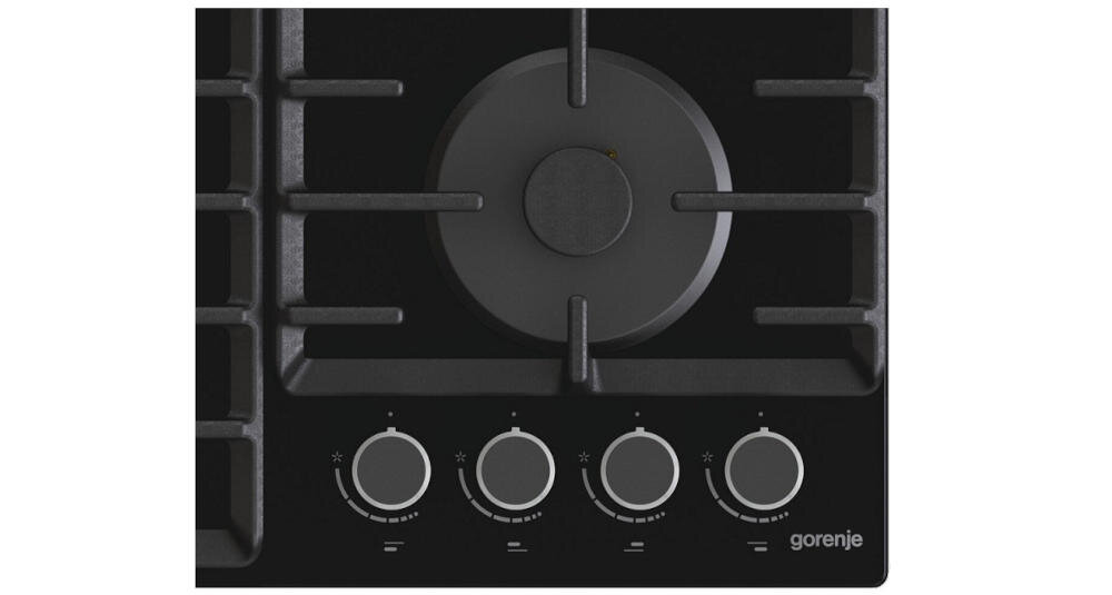 Czarna płyta gazowa z czterema pokrętłami i logo \'gorenje\'.