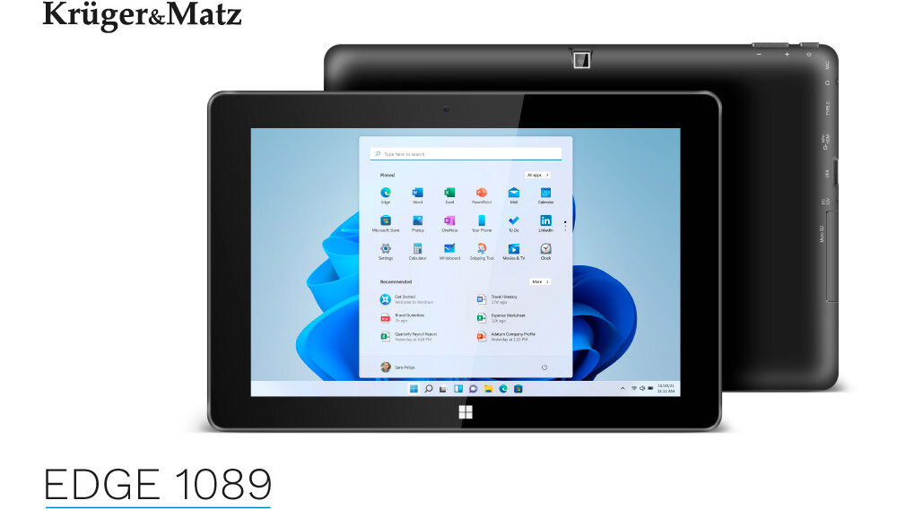 Na obrazie widoczny jest tablet z ekranem wyświetlającym interfejs systemu Windows. W tle znajduje się drugi tablet pokazujący tylną obudowę, a w lewym górnym rogu widnieje logo \'Krüger&Matz\'.