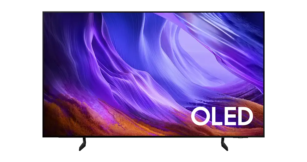 oled s83h 55 65 77 inch 1008x534 Telewizor z wyświetlaczem OLED prezentuje abstrakcyjny, kolorowy wzór w odcieniach fioletu i pomarańczu. Na ekranie widoczny jest napis \'OLED\'.