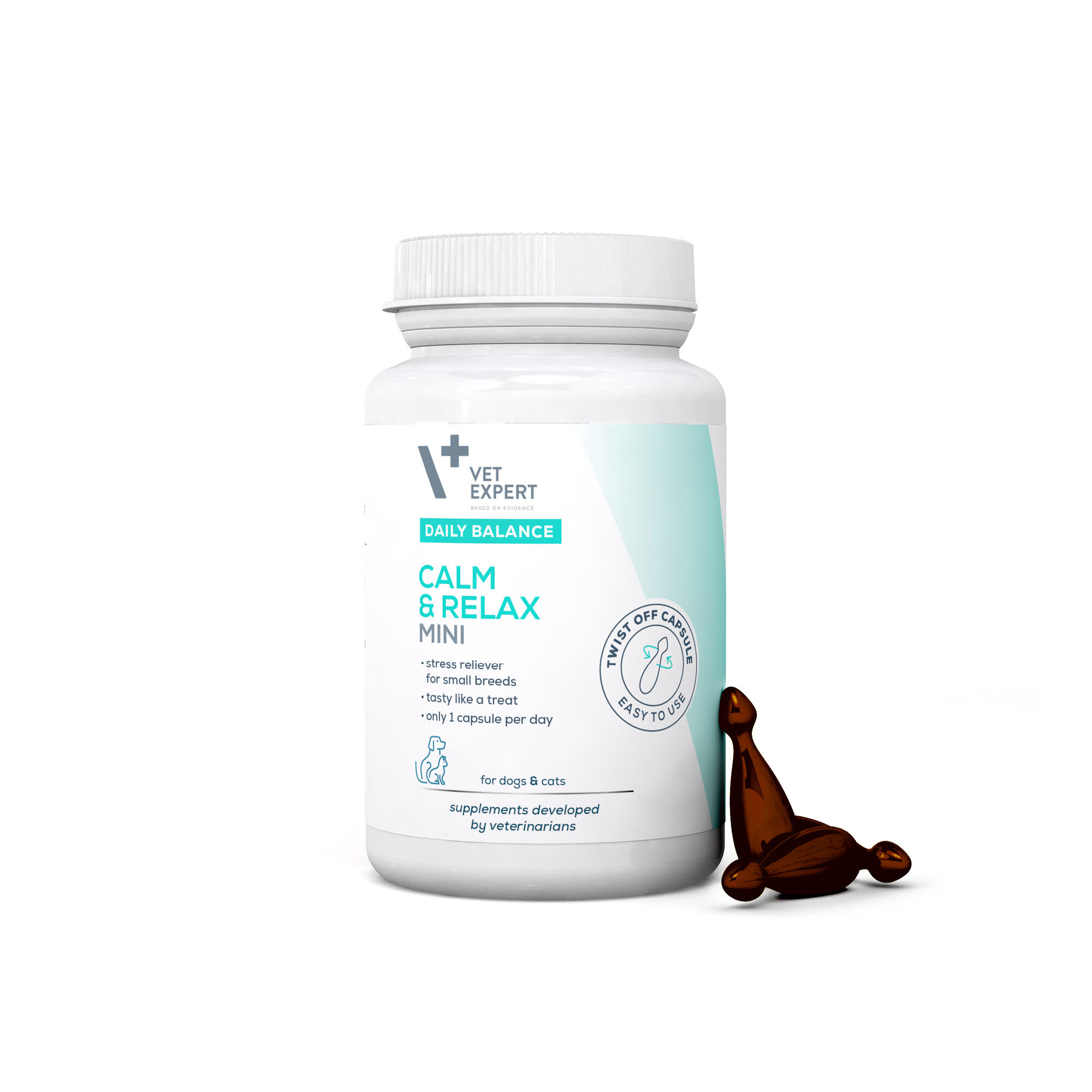 Biała butelka z etykietą \'Vet Expert Daily Balance Calm & Relax Mini\' oraz kapsułka obok. Etykieta zawiera informacje o produkcie dla psów i kotów, w tym \'stress reliever for small breeds\'.