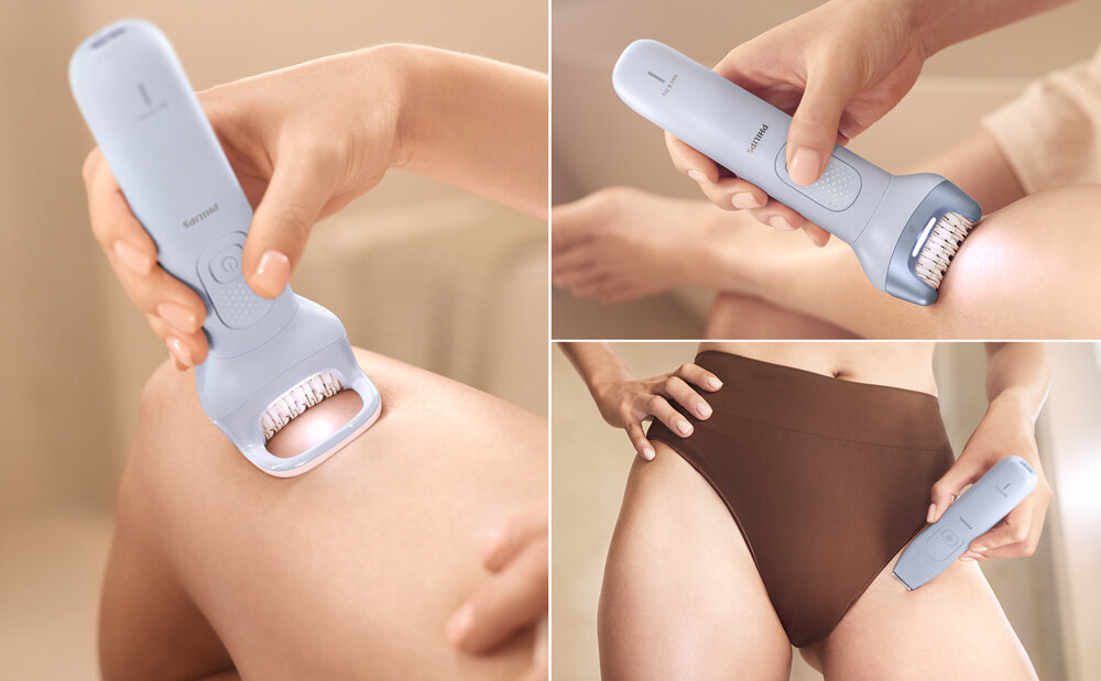 Na obrazie widać depilator w użyciu na skórze nóg i okolic bikini. Urządzenie jest w kolorze jasnoniebieskim z widocznym logo \'Philips\'.