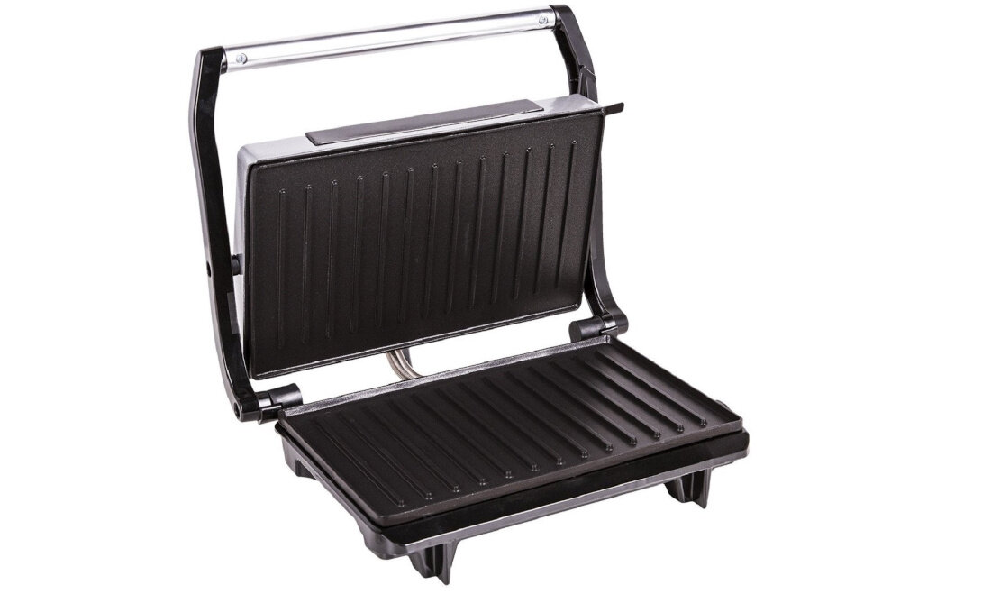 Na obrazie widoczny jest otwarty grill elektryczny z żebrowanymi płytami grzewczymi. Urządzenie ma czarną obudowę z metalicznymi elementami.
