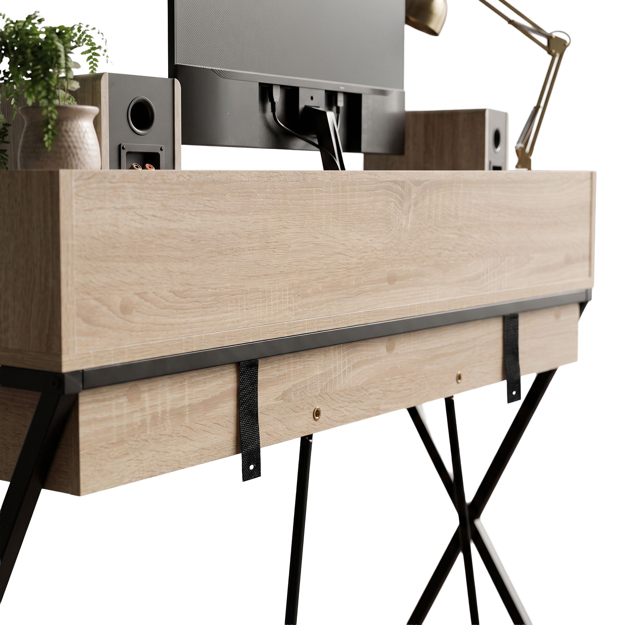 Biurko w stylu industrialnym z blatem w kolorze dębu Sonoma, posiada czarne metalowe nogi. Na biurku znajduje się monitor, głośniki i lampa biurkowa.