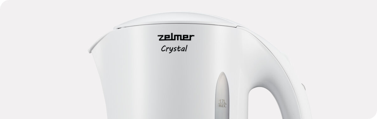 Biały czajnik elektryczny z widocznym logo \'zelmer Crystal\' oraz wskaźnikiem poziomu wody z oznaczeniem \'1.7L max\'.