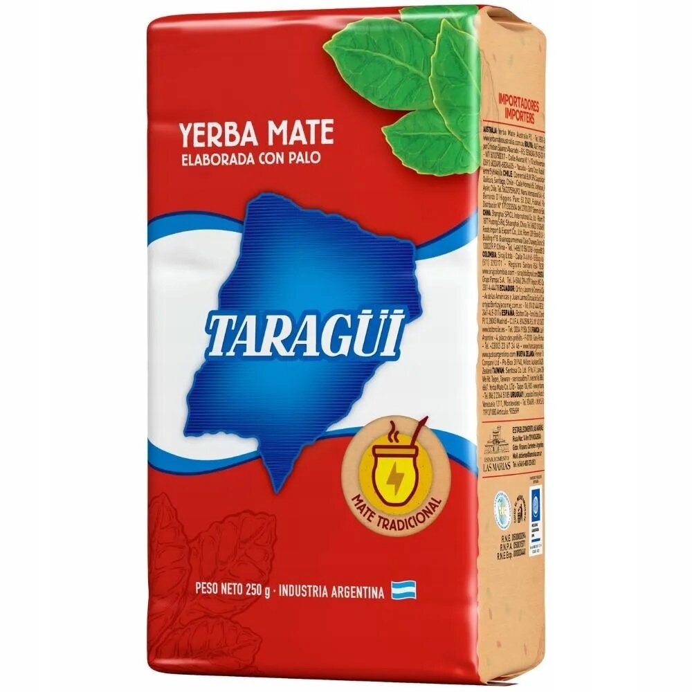 Opakowanie yerba mate marki Taragüi o wadze netto 250 g, z grafiką przedstawiającą niebieski kształt na czerwonym tle oraz zielone liście. Na opakowaniu widnieje napis \'Yerba Mate Elaborada Con Palo\' oraz \'Mate Tradicional\'.
