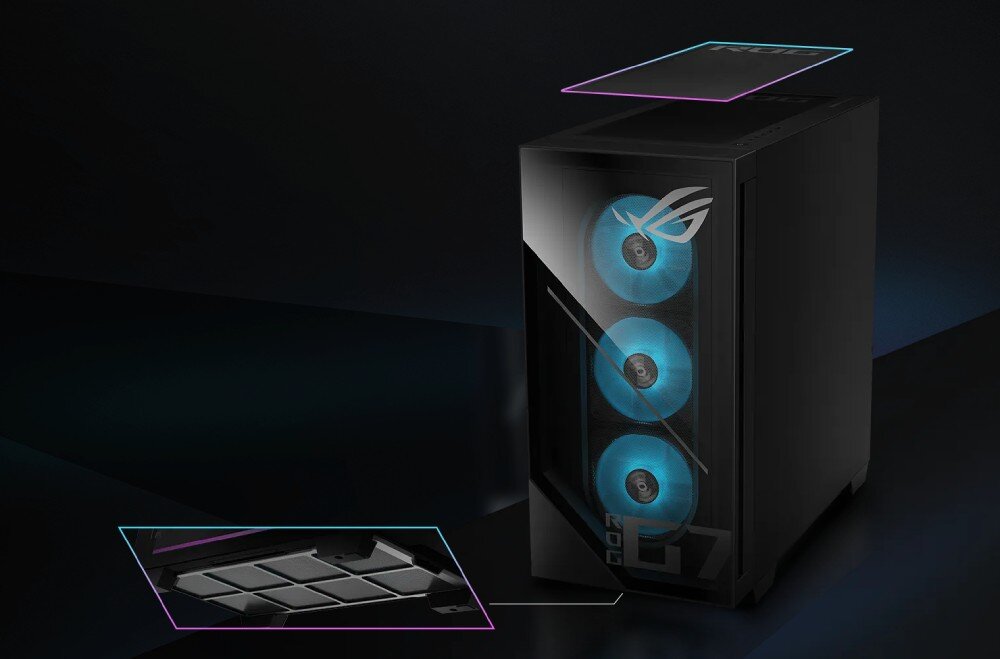 Komputer ASUS ROG G700TF-07265F421W Zbliżenie na szklany przód komputera z trzema niebieskimi wentylatorami i zaznaczonymi filtrami przeciwkurzowymi na górze oraz spodzie obudowy, filtry przeciwkurzowe, czystość