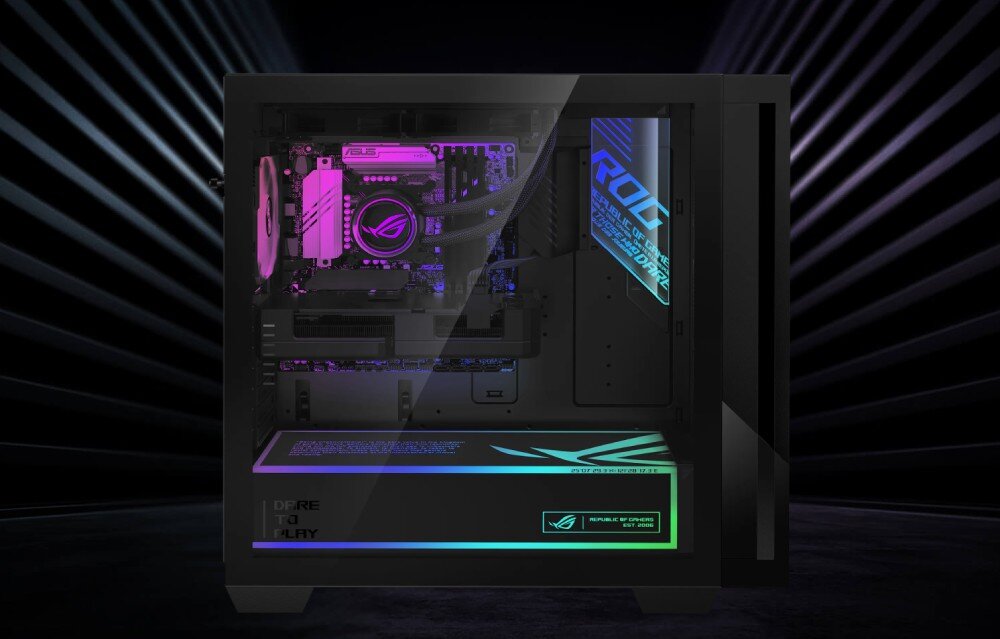 Komputer ASUS ROG G700TF-07265F421W Widok z boku na wnętrze komputera z podświetleniem RGB w odcieniach różu i zieleni, z widoczną płytą główną i chłodzeniem procesora, komponenty RGB, podświetlenie