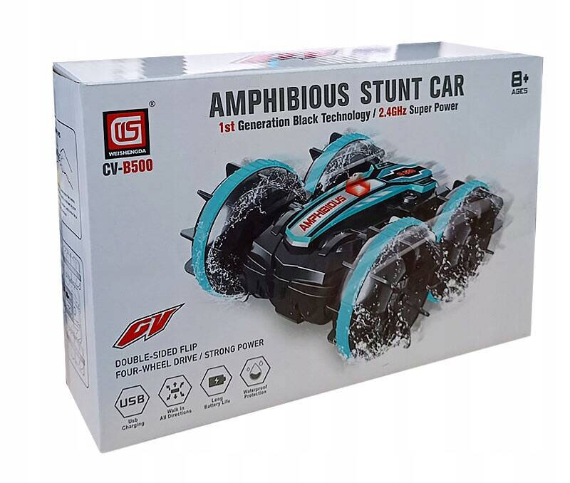 Opakowanie z zabawkowym samochodem zdalnie sterowanym o nazwie \'Amphibious Stunt Car\'. Na opakowaniu widoczne są informacje: \'1st Generation Black Technology / 2.4GHz Super Power\', \'Double-sided flip\', \'Four-wheel drive\', \'Strong power\', oraz ikony wskazujące na ładowanie USB, jazdę we wszystkich kierunkach, długą żywotność baterii i wodoodporność.