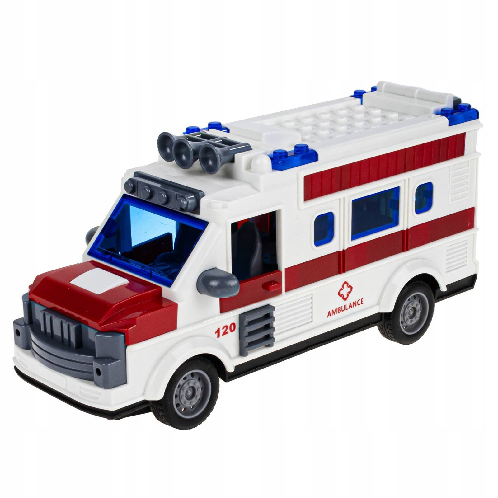 Zabawka w kształcie karetki pogotowia w kolorze białym z czerwonymi i niebieskimi elementami. Na boku widoczny jest napis \'AMBULANCE\' oraz liczba \'120\'.