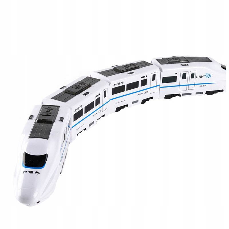 Na obrazie widoczny jest biały model elektrycznego pociągu z czarnymi i niebieskimi detalami. Na pociągu znajduje się logo \'CRH\'.