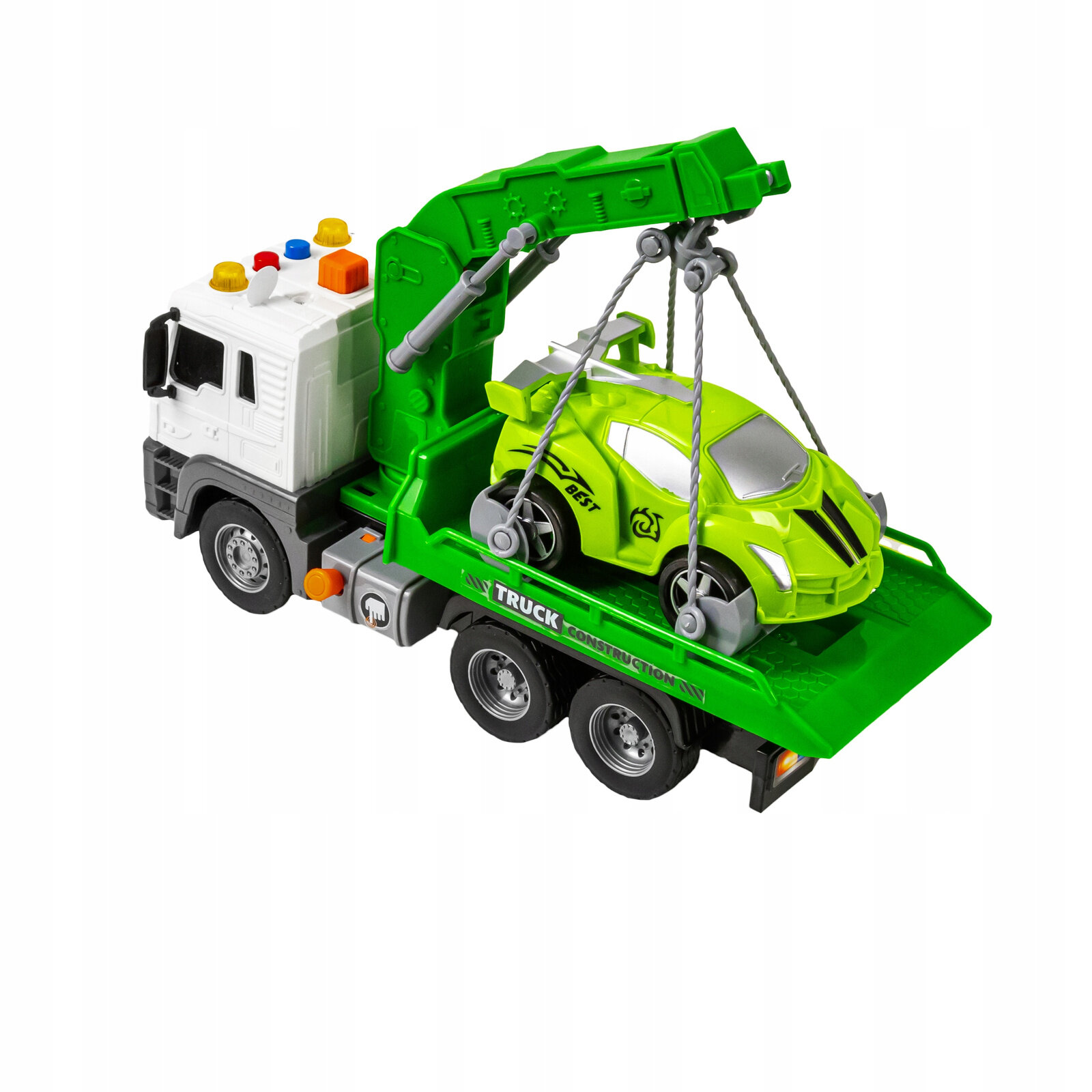 Zabawka przedstawia biało-zielony holownik z ruchomą naczepą, na której znajduje się zielone autko. Na naczepie widoczny jest napis \'TRUCK CONSTRUCTION\'.