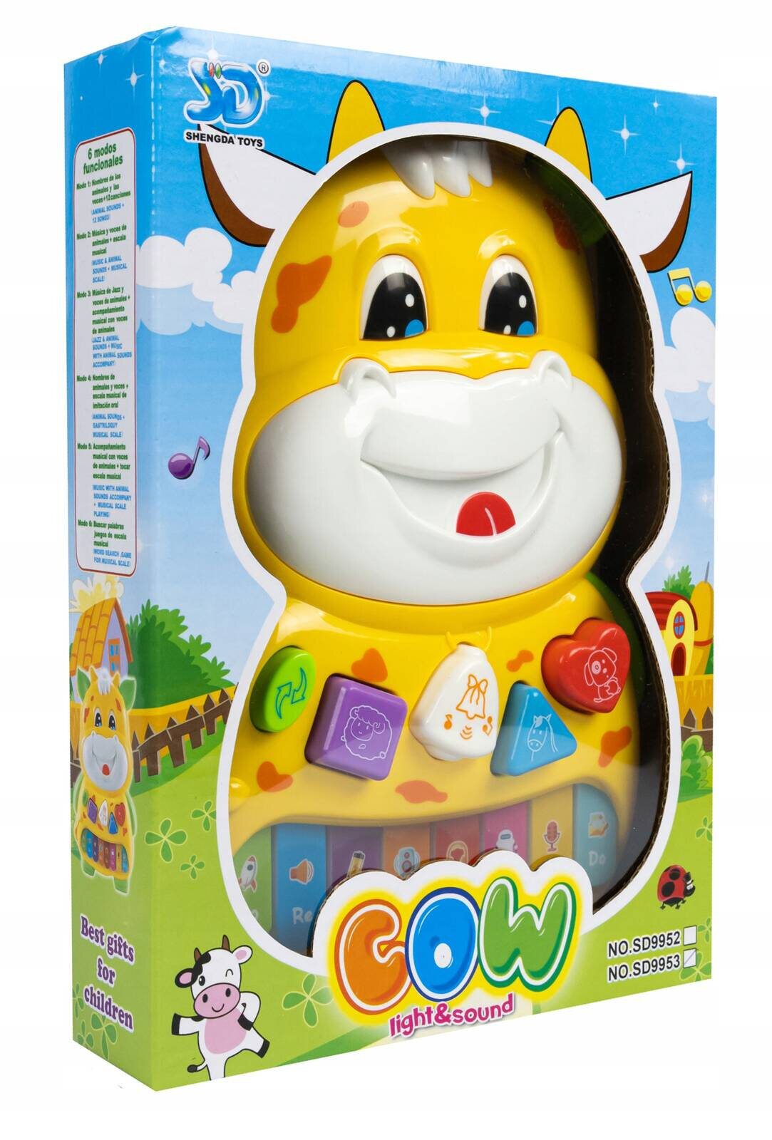 Opakowanie zabawki w kształcie krowy z kolorowymi przyciskami i napisem \'COW light & sound\'. Widoczne logo \'SHENGDA TOYS\' oraz tekst \'Best gifts for children\'.