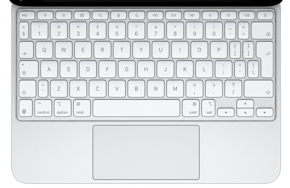 Biała klawiatura z układem QWERTY, posiada klawisze funkcyjne oraz touchpad poniżej klawiszy. Widoczne są klawisze z symbolami, literami i cyframi.