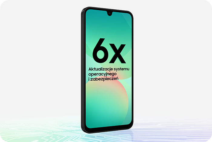 Smartfon z wyświetlaczem pokazującym tekst: \'6x Aktualizacje systemu operacyjnego i zabezpieczeń\'. Urządzenie jest czarne, z widocznym ekranem i zaokrąglonymi rogami.