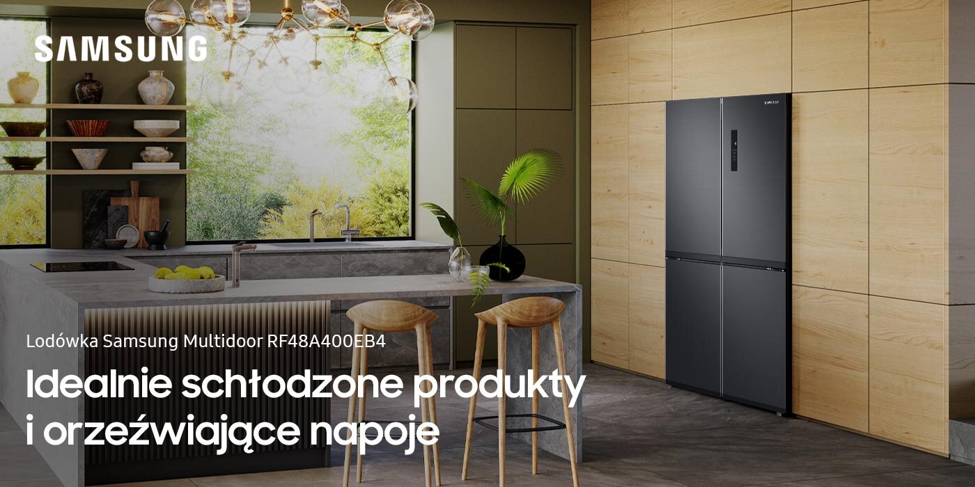 Model lodówki Multidoor Samsung RF48A400EB4 oferowany przez Media Expert jest doskonałym wyborem do nowoczesnych kuchni W kuchni znajduje się lodówka w grafitowym kolorze, obok której stoi wyspa kuchenna z trzema stołkami. Na obrazie widoczny jest tekst: \'Lodówka Samsung Multidoor RF48A400EB4 Idealnie schłodzone produkty i orzeźwiające napoje\'.