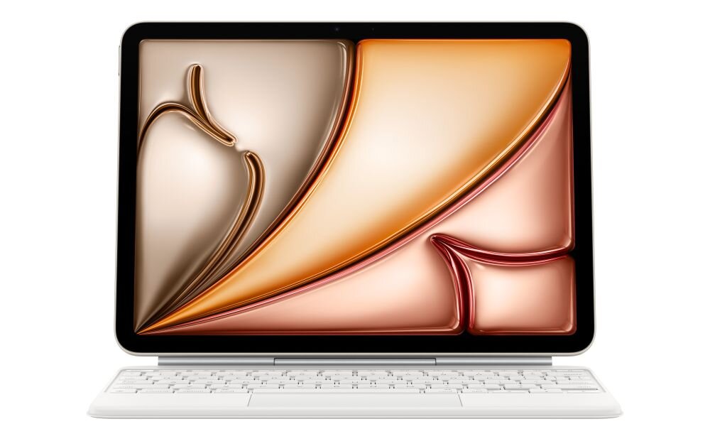 Na obrazie widoczny jest tablet z kolorowym, abstrakcyjnym wzorem na ekranie, umieszczony na białej klawiaturze. Klawiatura jest częścią etui, które pełni funkcję stojaka dla tabletu.