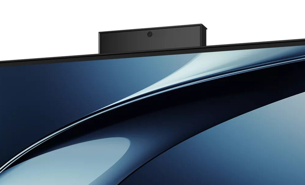 Komputer All in One ASUS V440VAT-BPD036W Zbliżenie na górną krawędź obudowy komputera z wysuniętą prostokątną kamerą internetową, umieszczoną nad ekranem wyświetlającym ciemnoniebieską grafikę, kamera, chowanie obiektywu, podczerwień